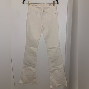 White flare bottom low to mid rise white jeans